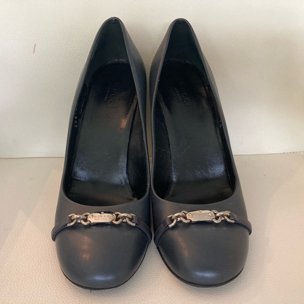 Navy Gucci pump with silver buckle